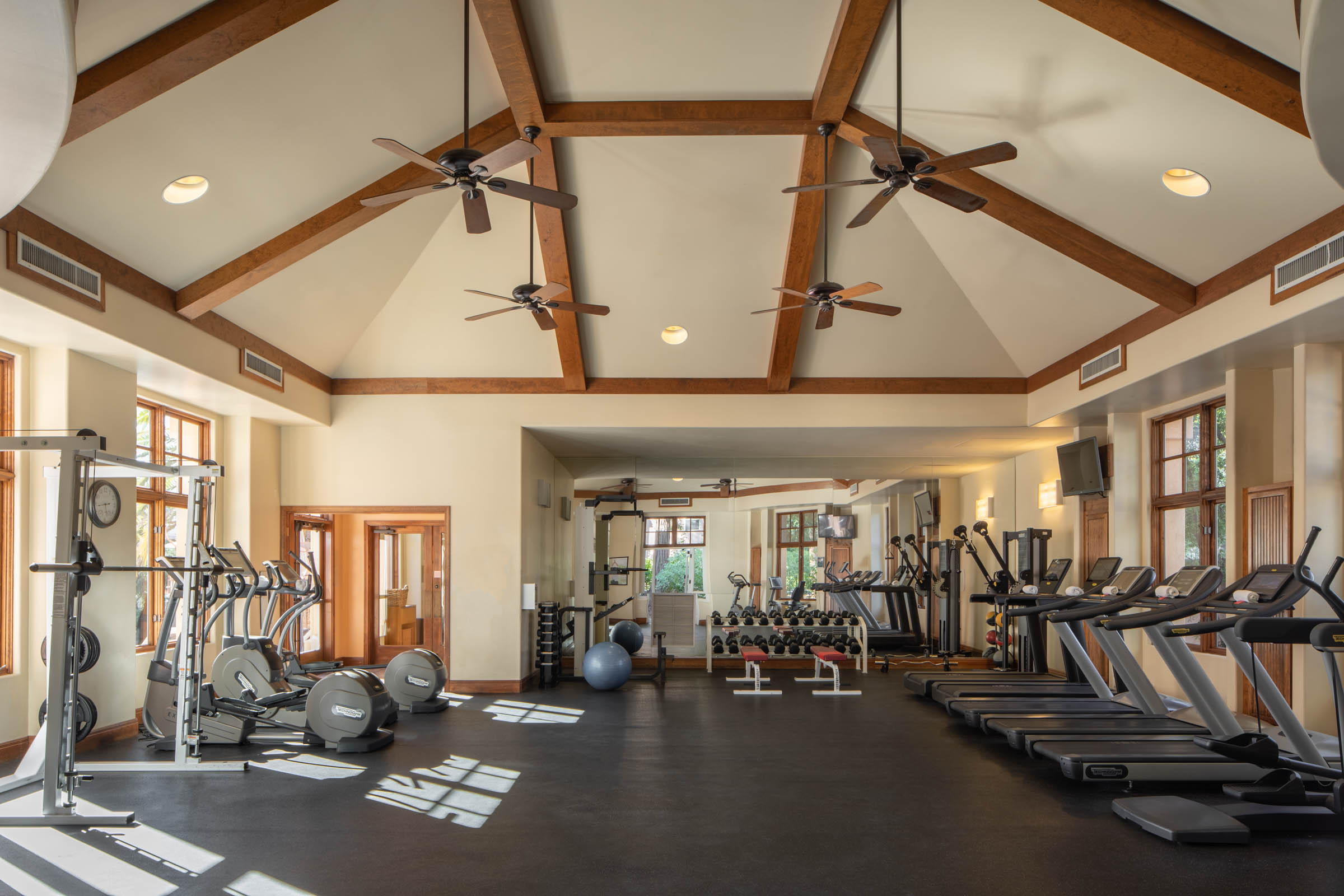 a large gym with exercise equipment