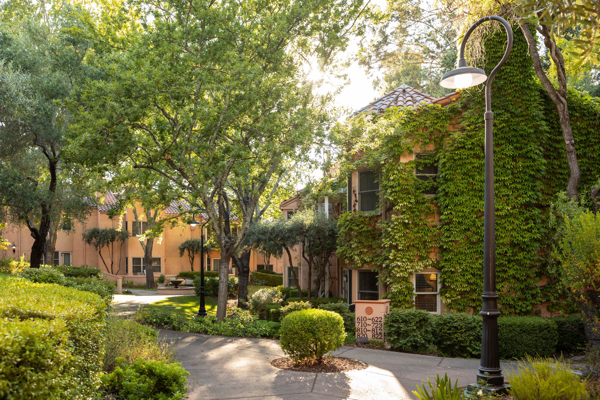 a building with trees and bushes