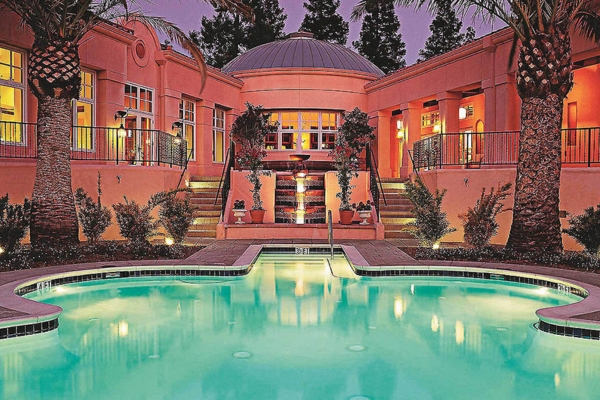 a pool in front of a building