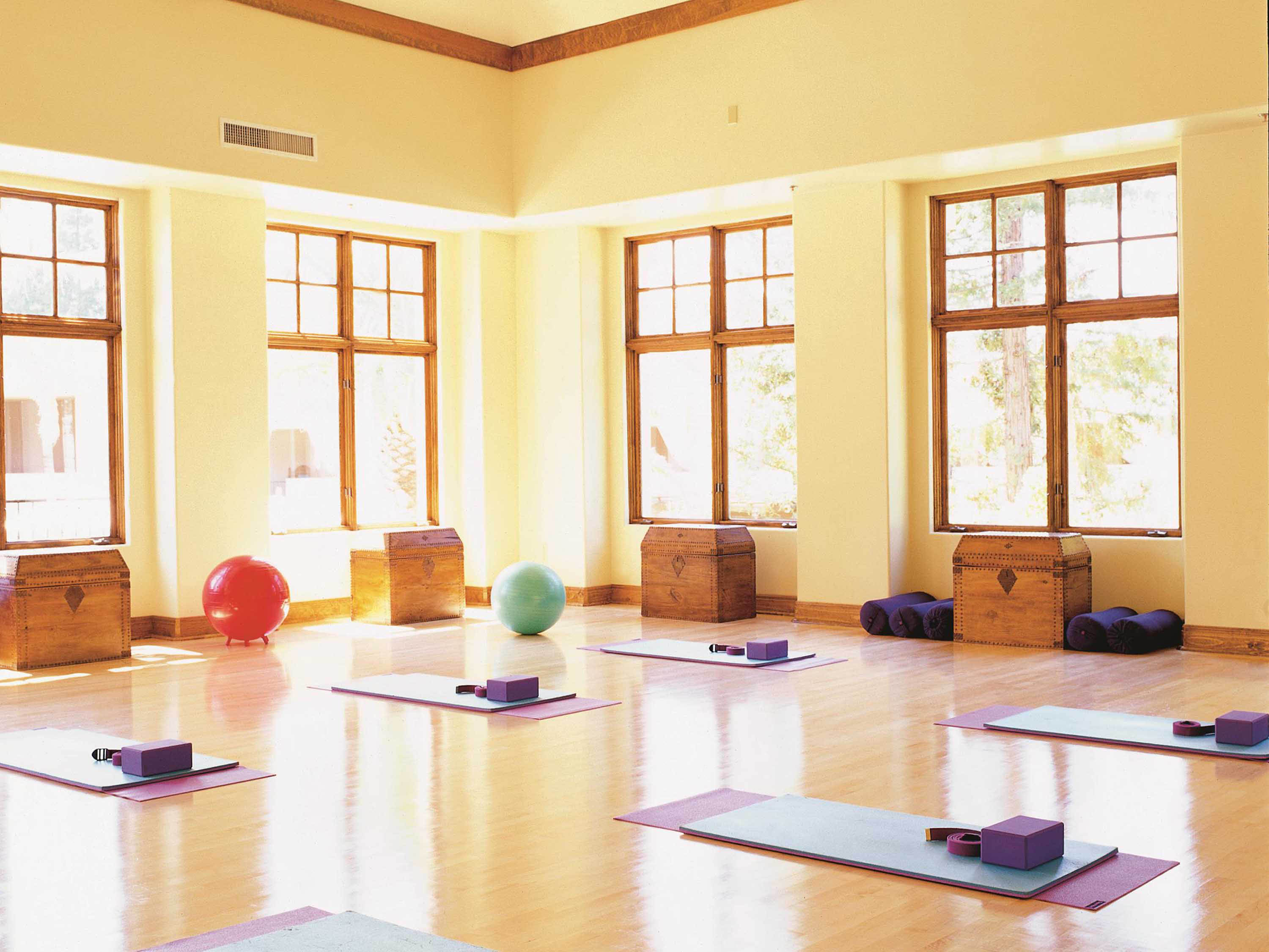 a room with mats and balls