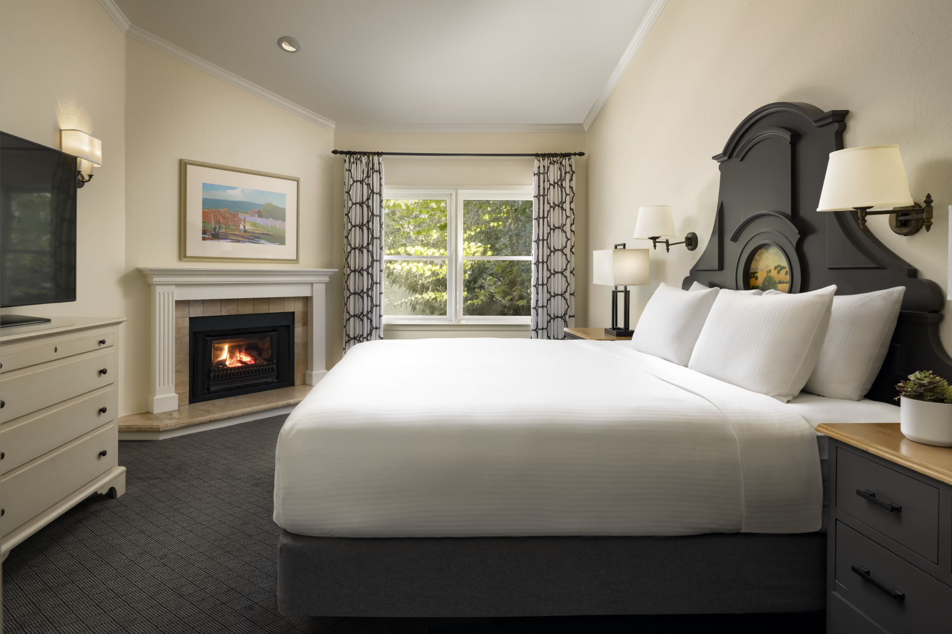 a bed with a fireplace in a room