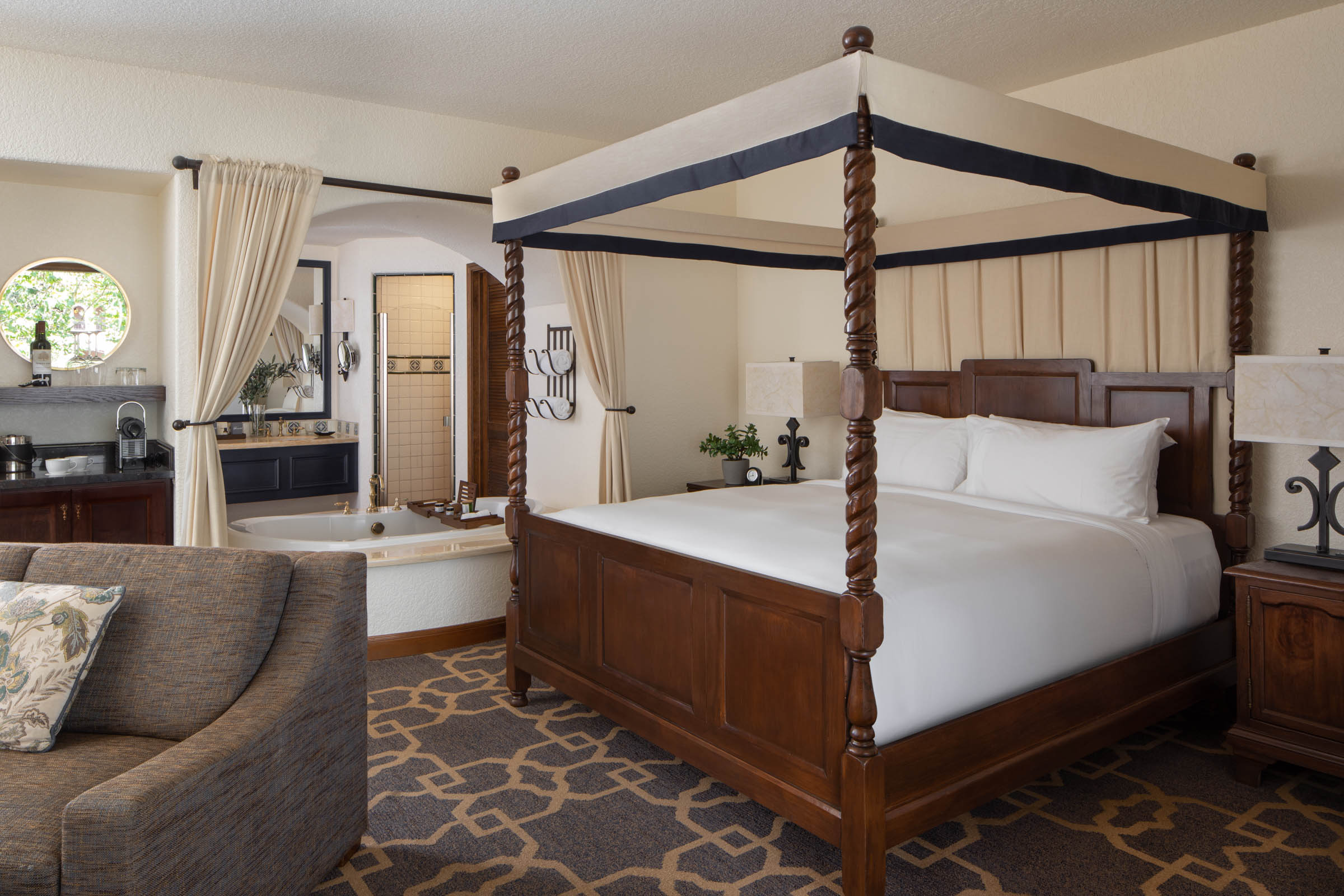 a room with a bed and a tub