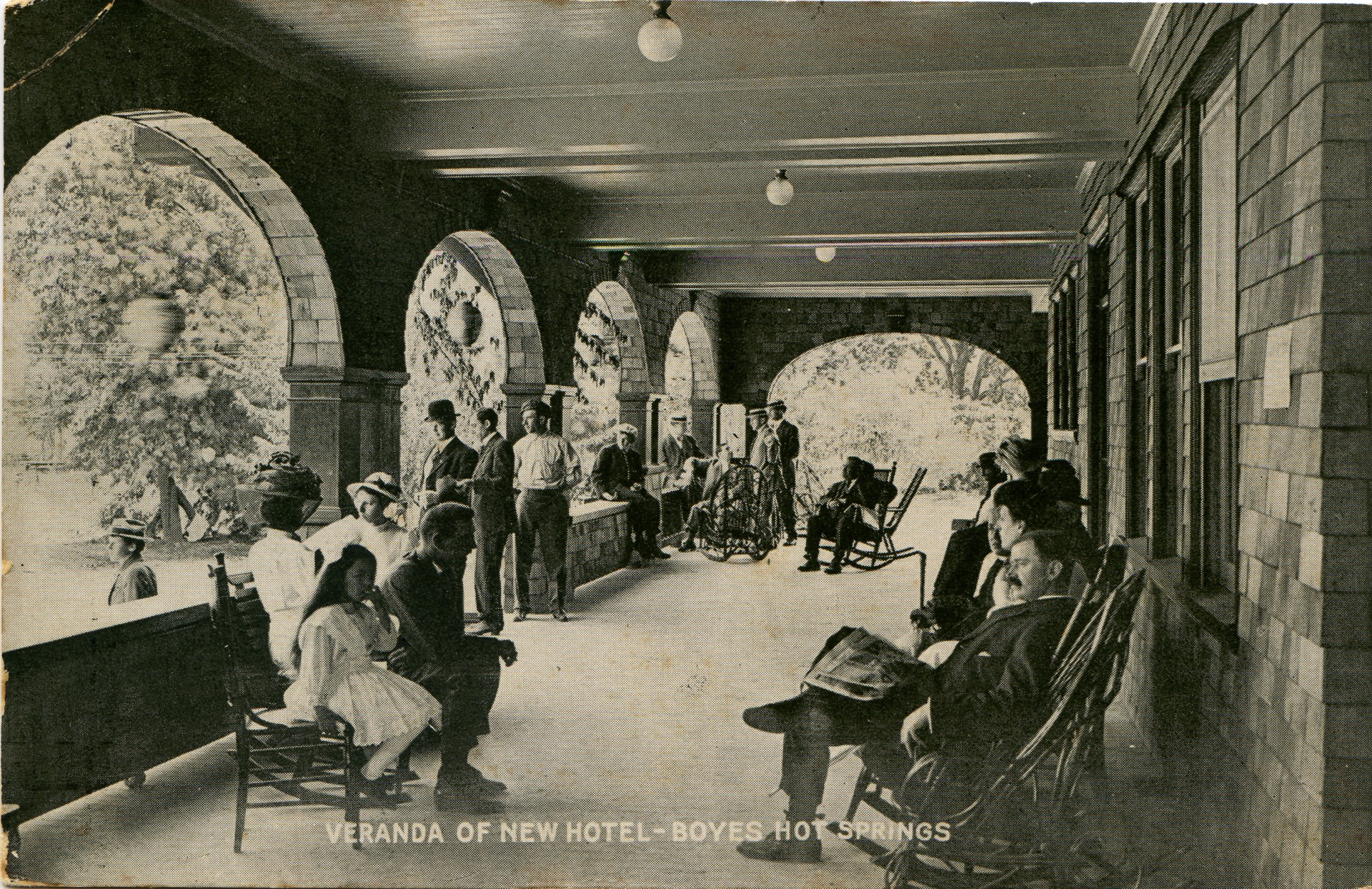 a group of people sitting in chairs in a room