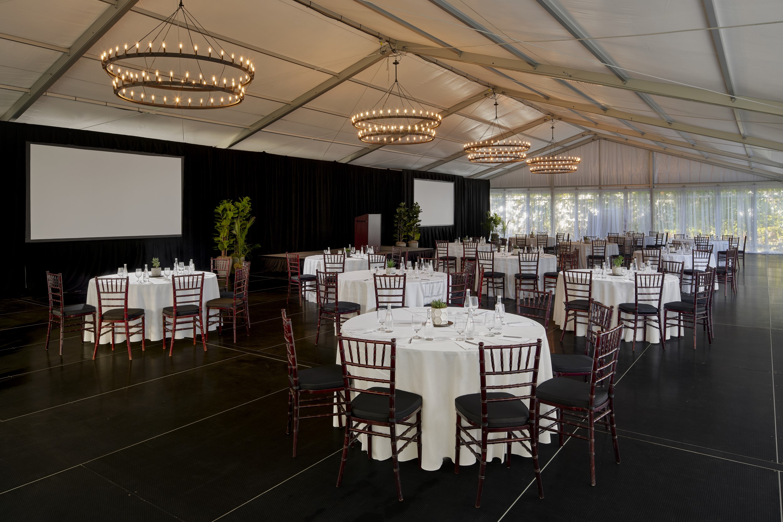 a large room with tables and chairs