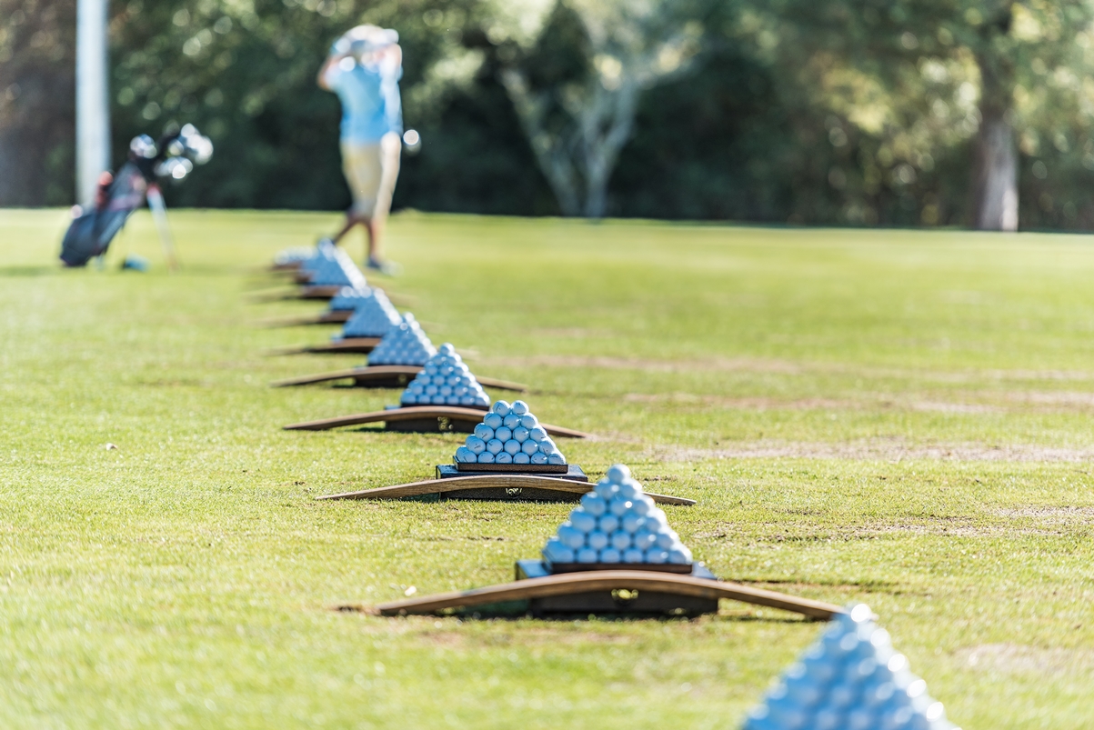 a group of golf balls on a field