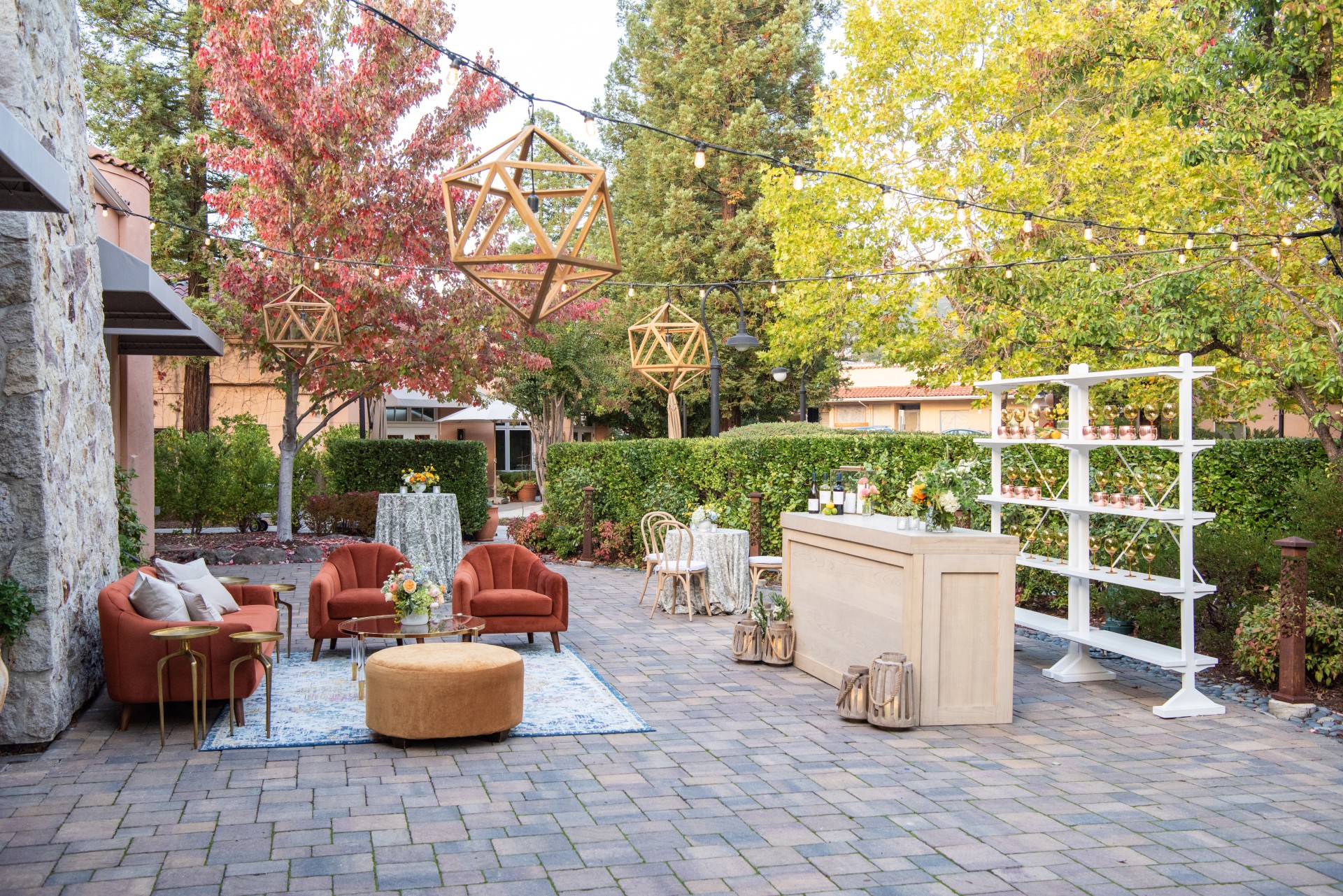 a patio with furniture and a table