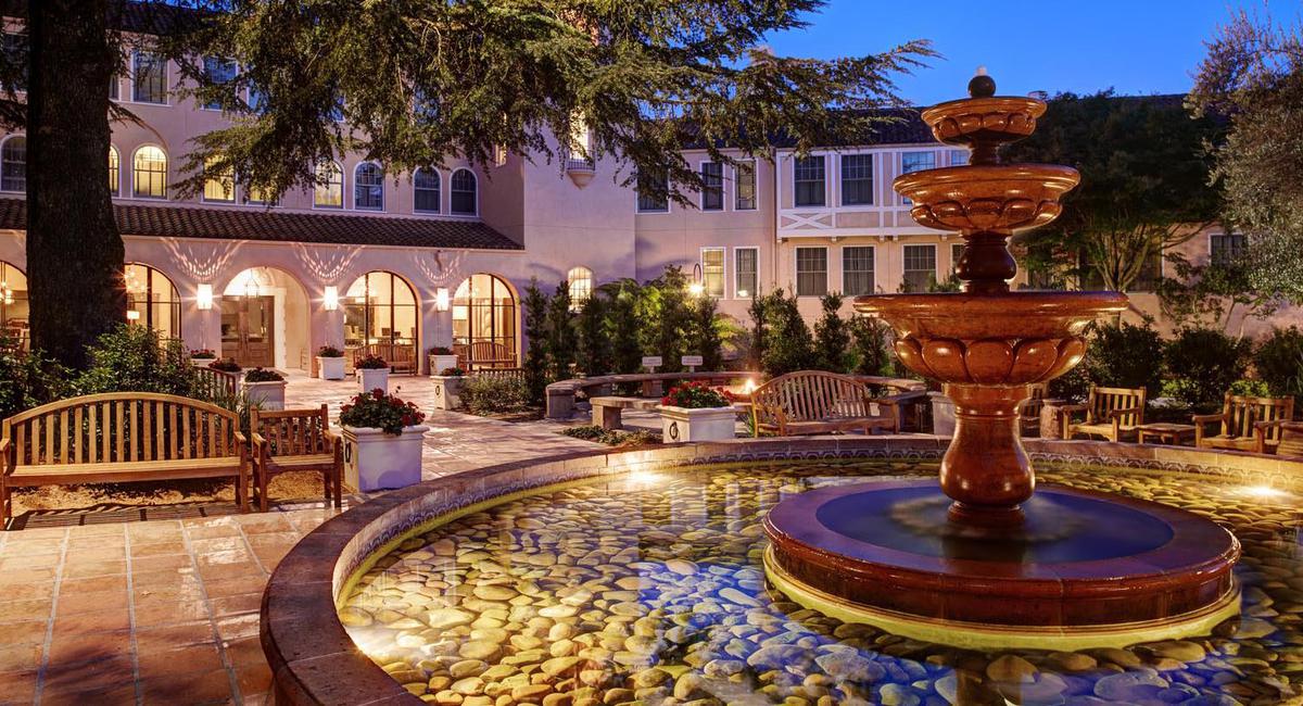 a fountain in front of a building