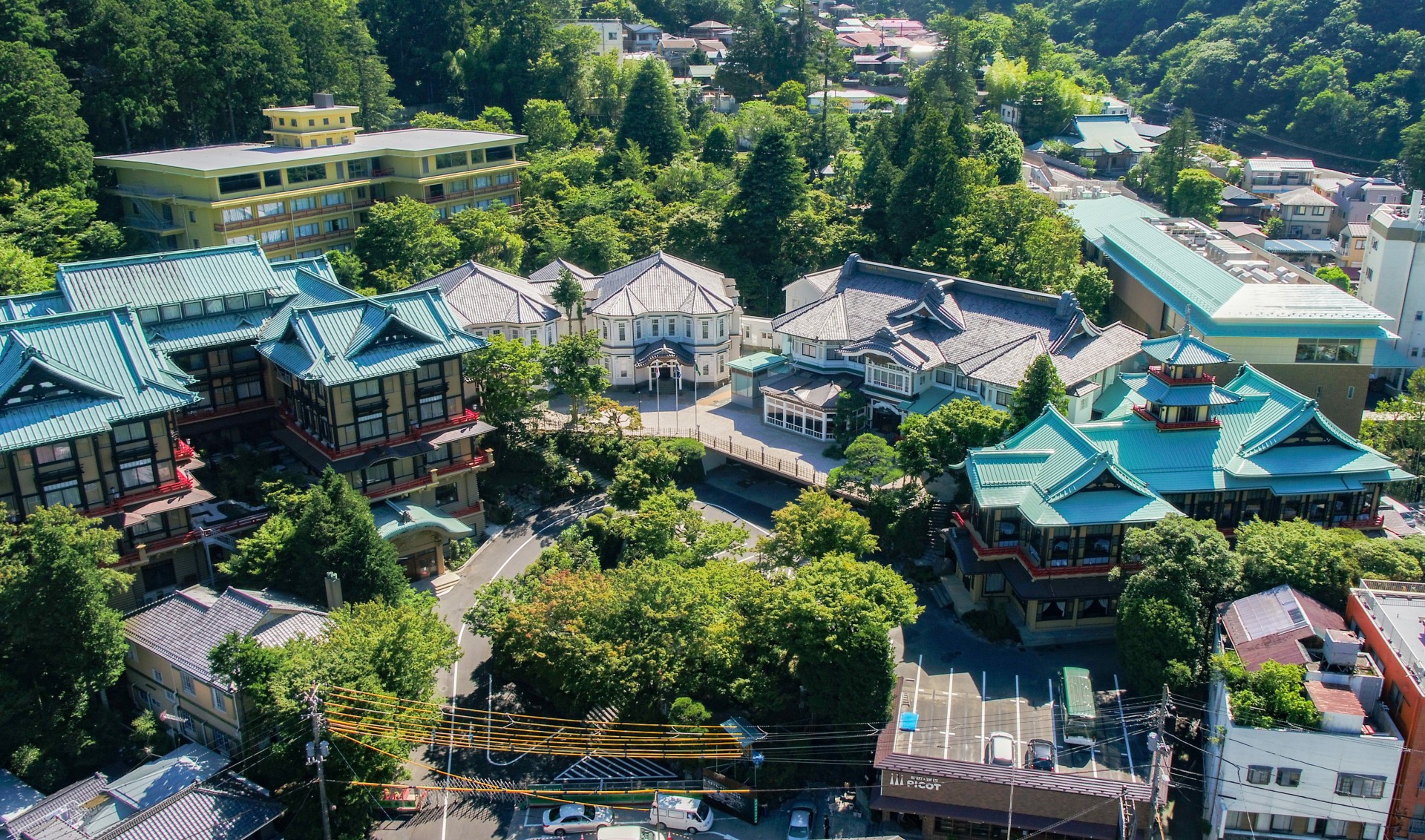 a group of buildings with trees around them