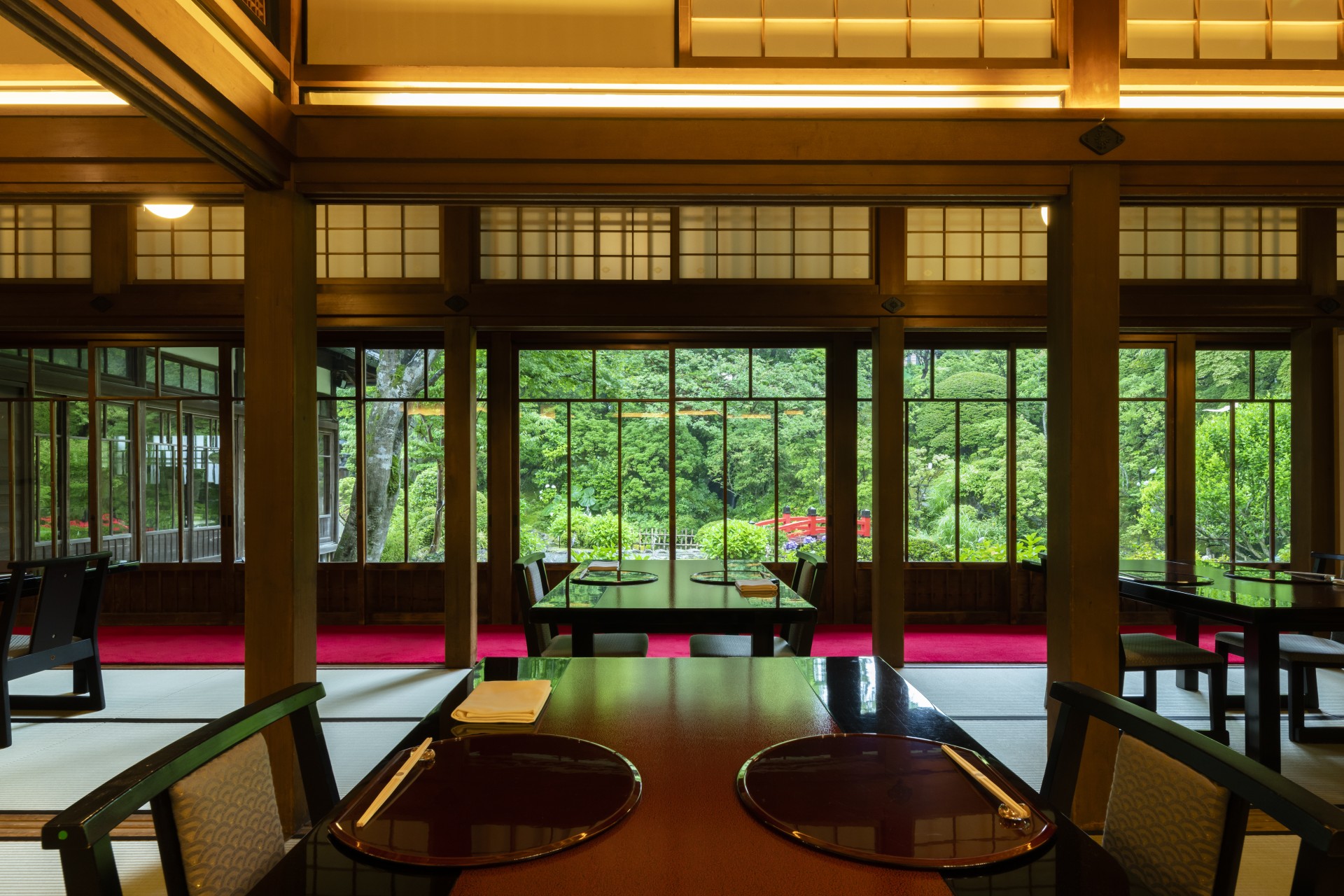 a dining room with a table and chairs