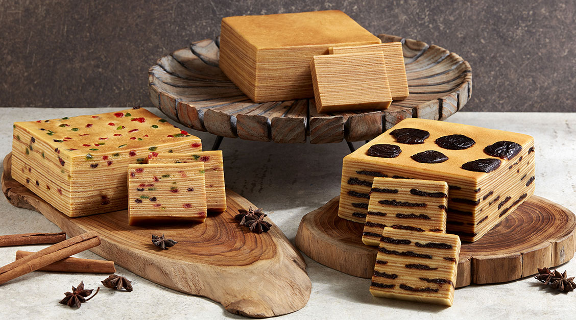 a group of food on a wooden tray