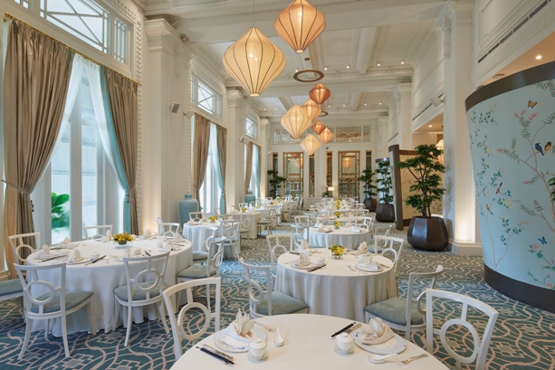 a room with tables and chairs