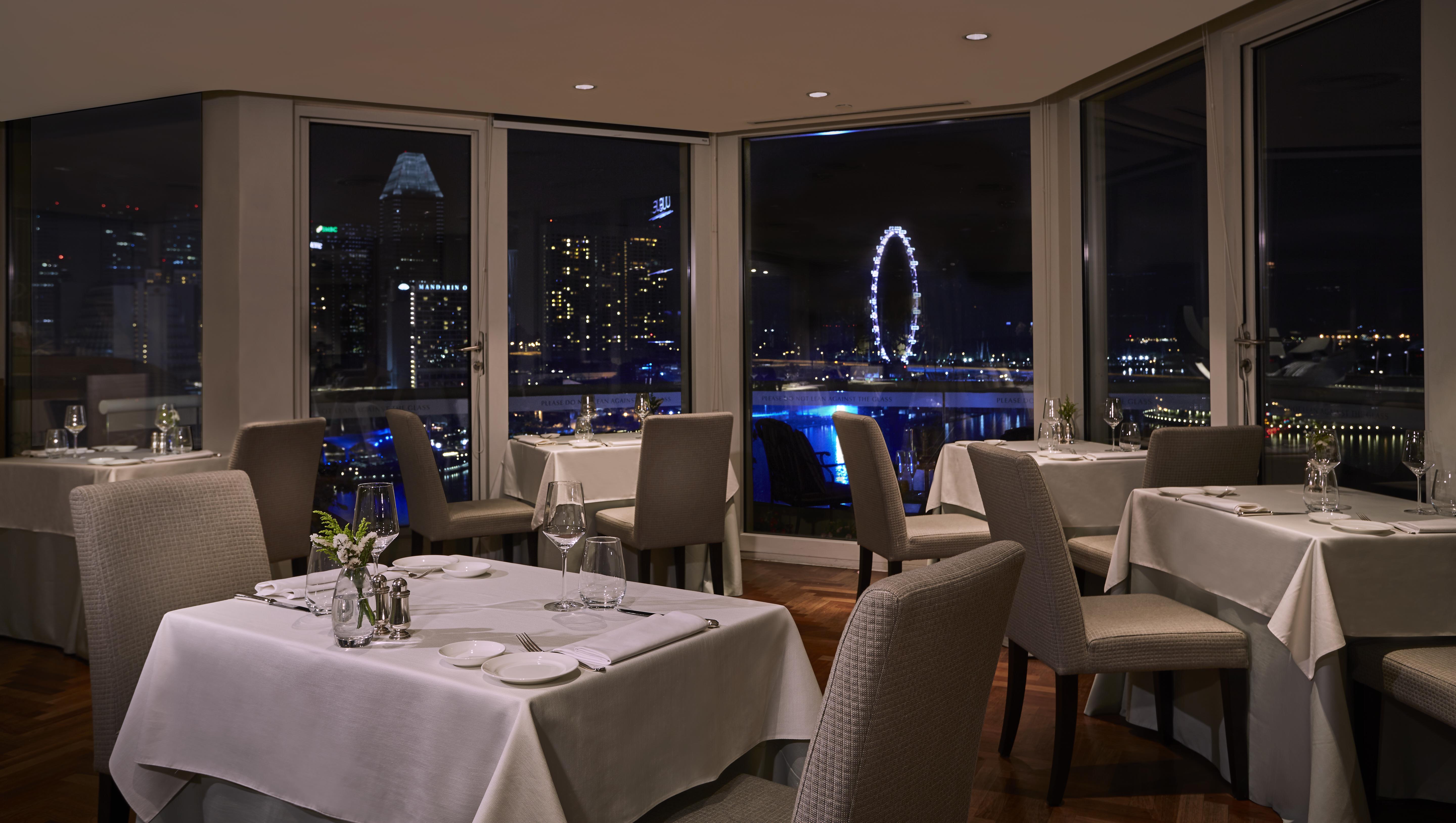 a restaurant with tables and chairs
