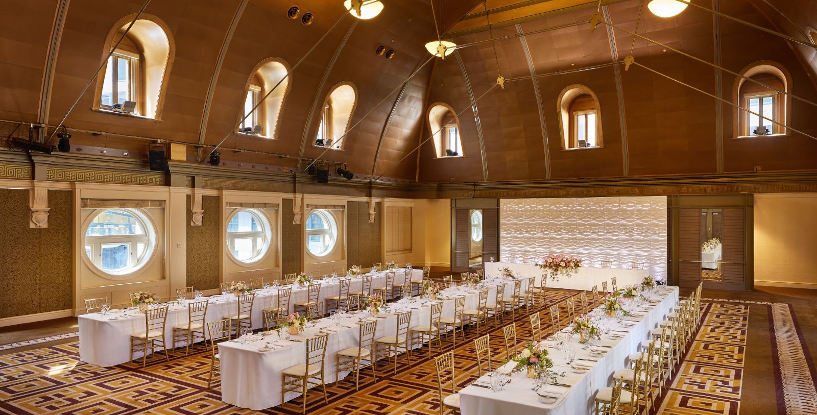 a large room with tables and chairs