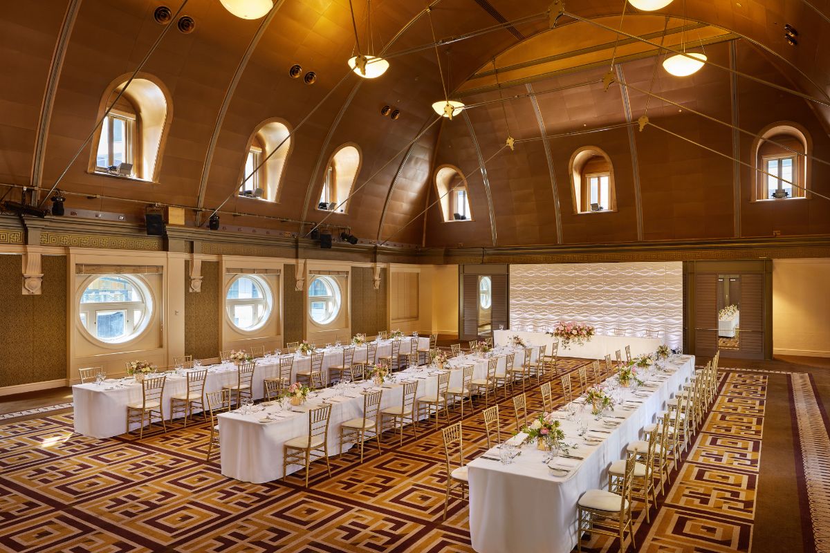 a large room with tables and chairs