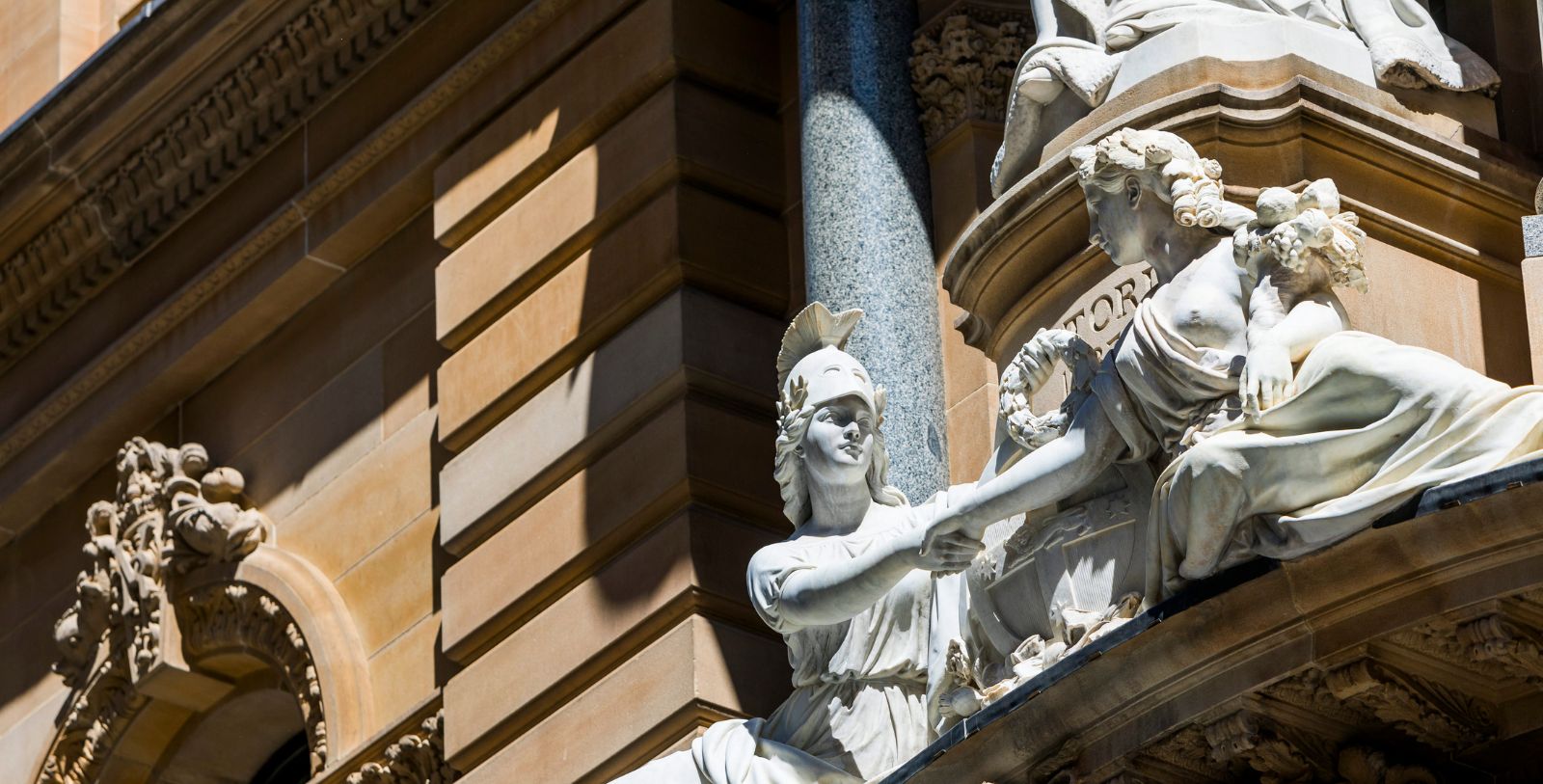 a statue of a woman holding a woman