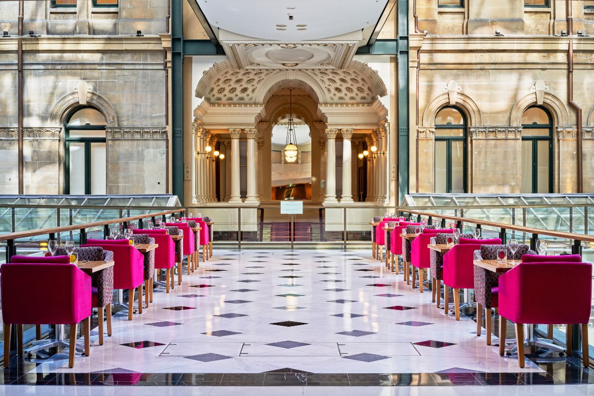 a restaurant with tables and chairs
