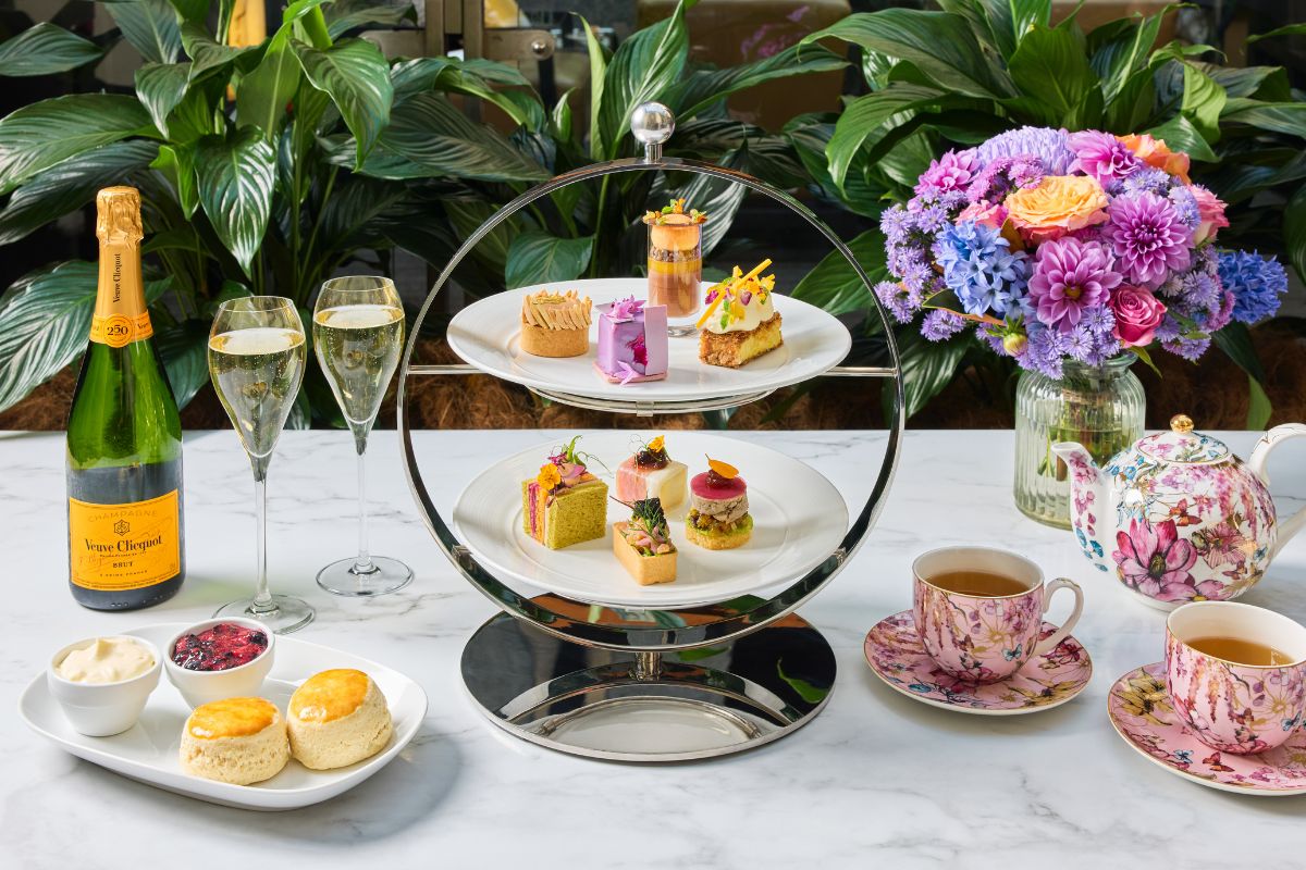 a tray of desserts and drinks on a table