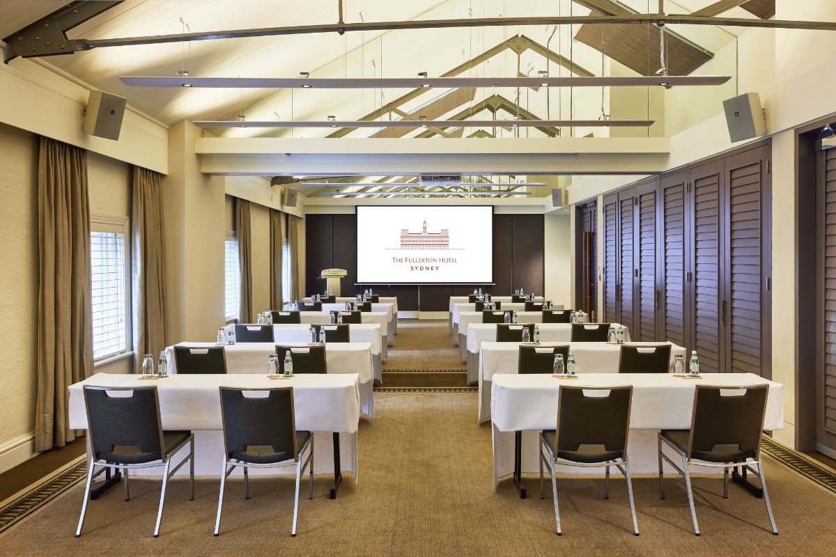 a room with tables and chairs