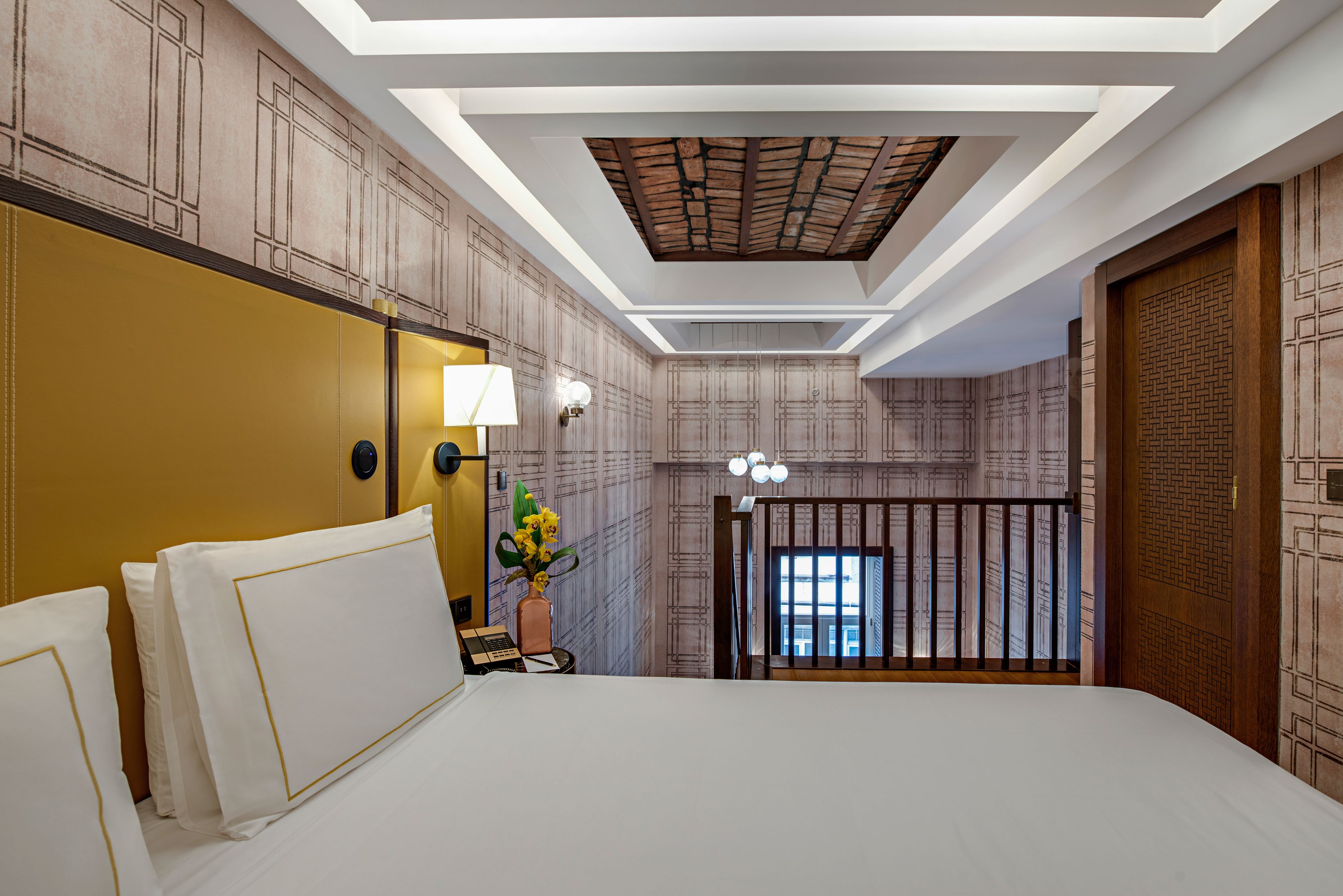 a bed with a yellow door and a yellow door