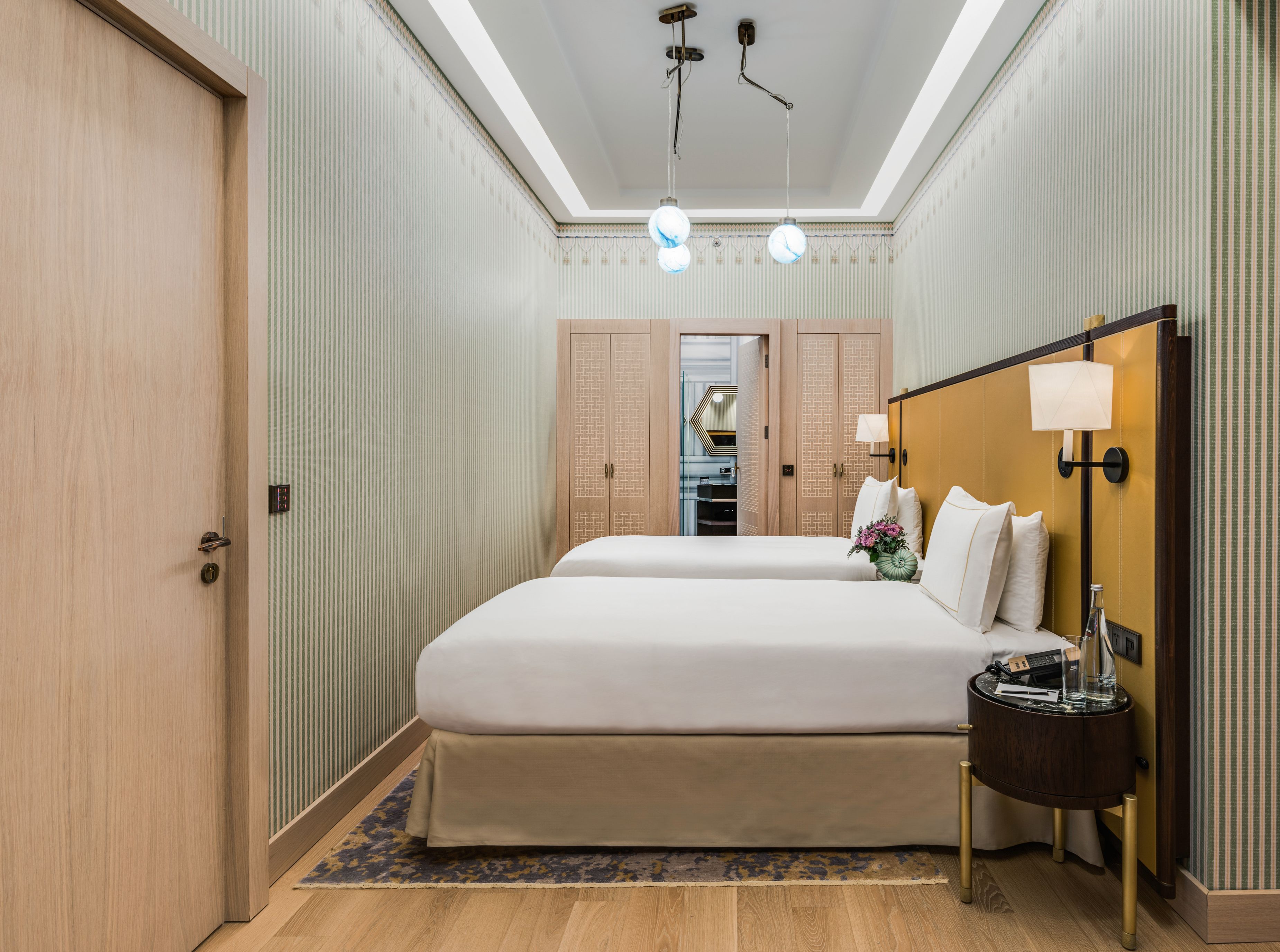 a two beds in a room