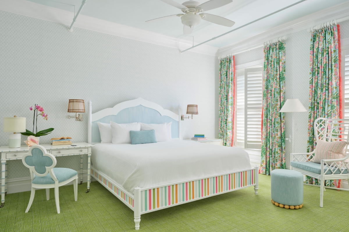 a room with a bed and a desk