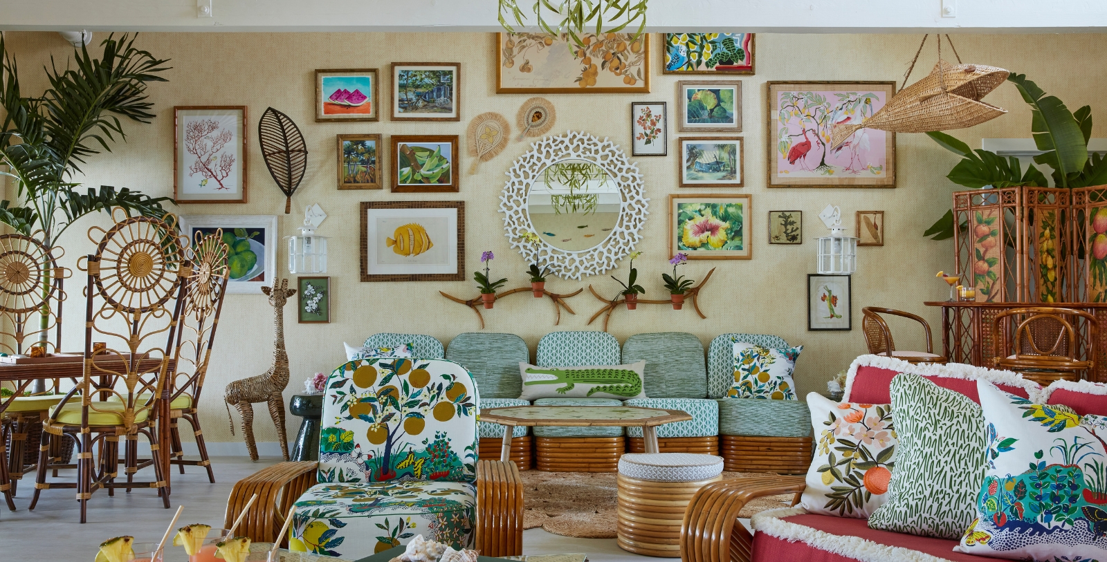 a room with a couch and chairs