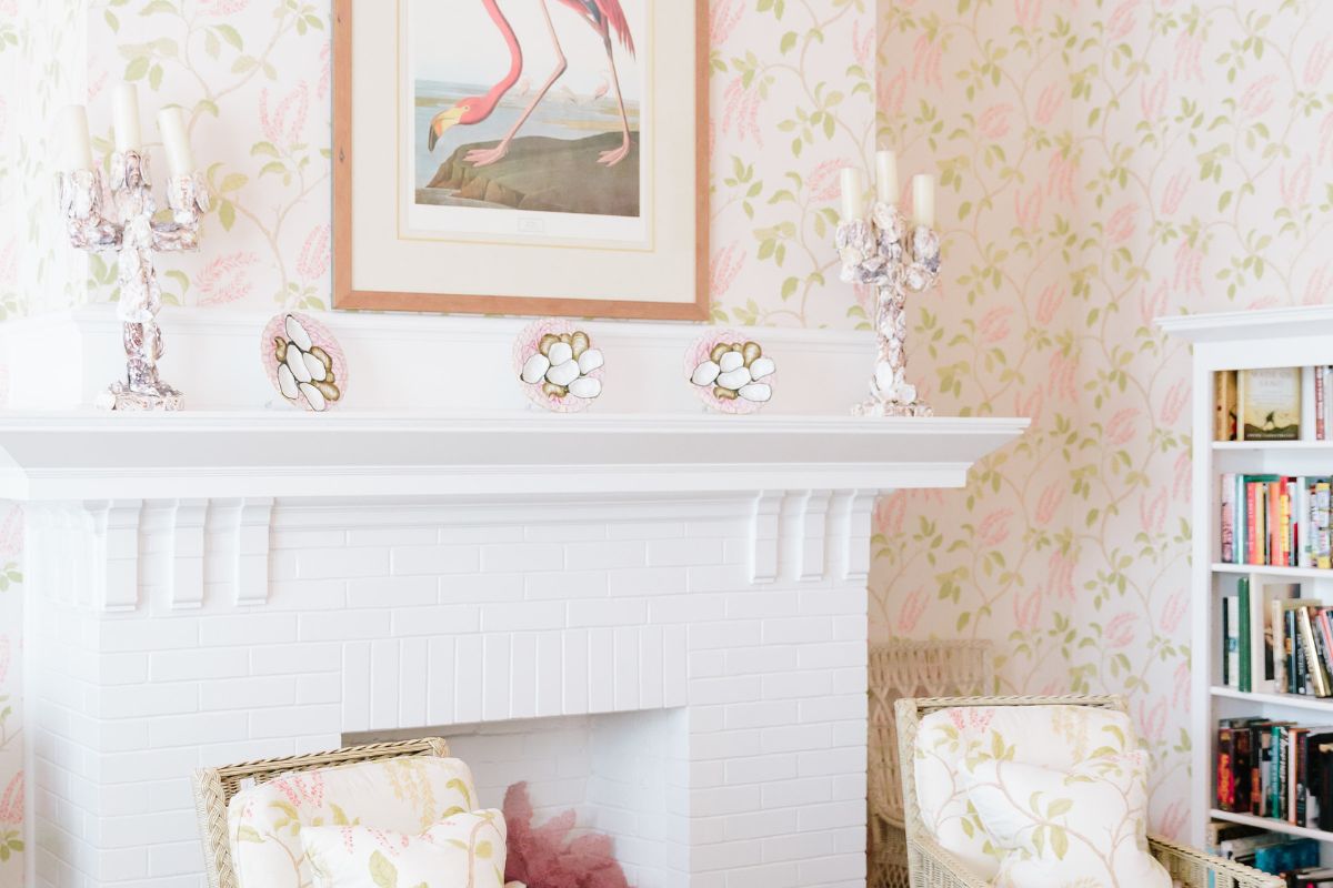 a fireplace with a picture of a flamingo