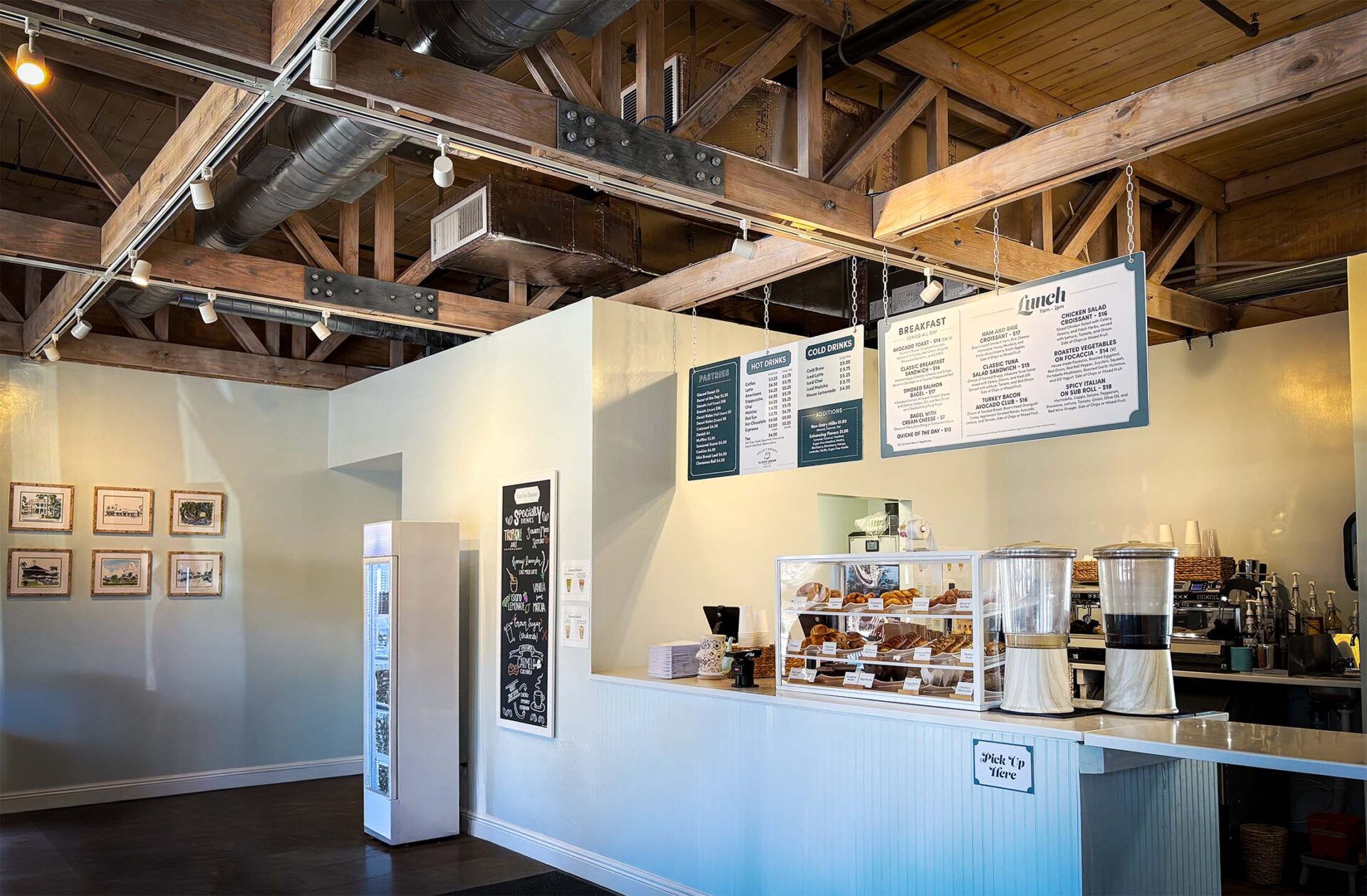 a coffee shop with a counter and menus