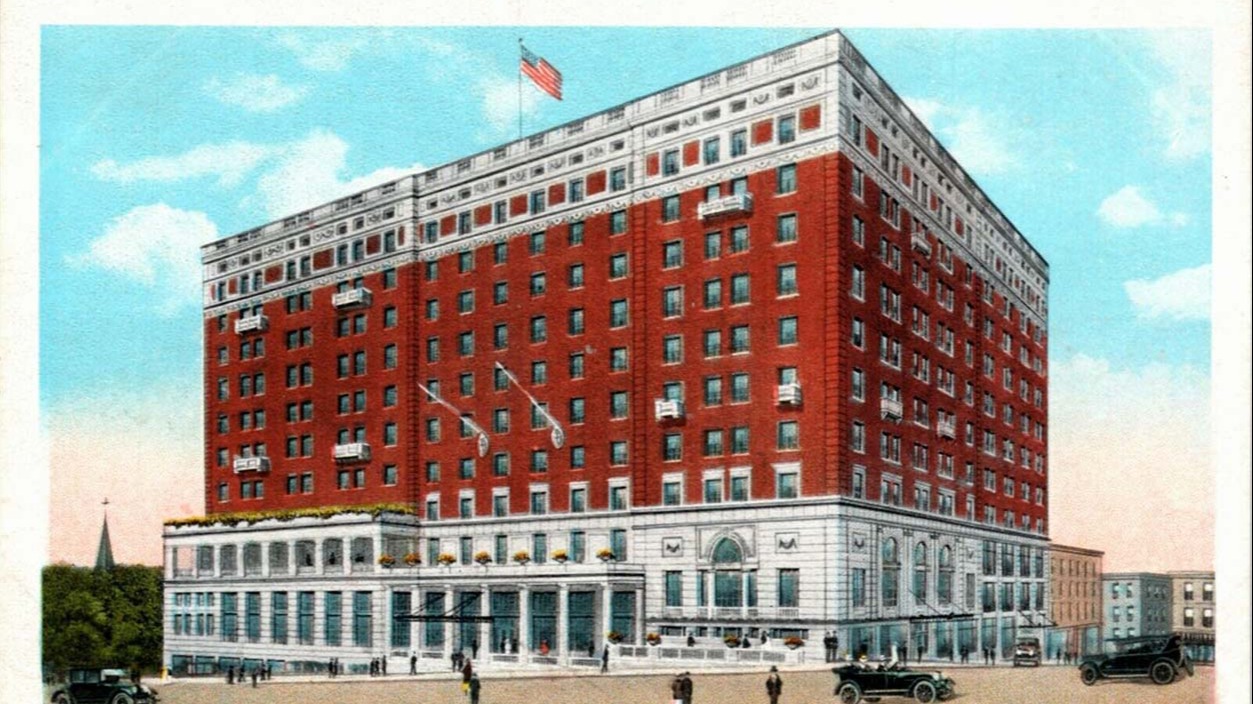 a large building with a flag on the top