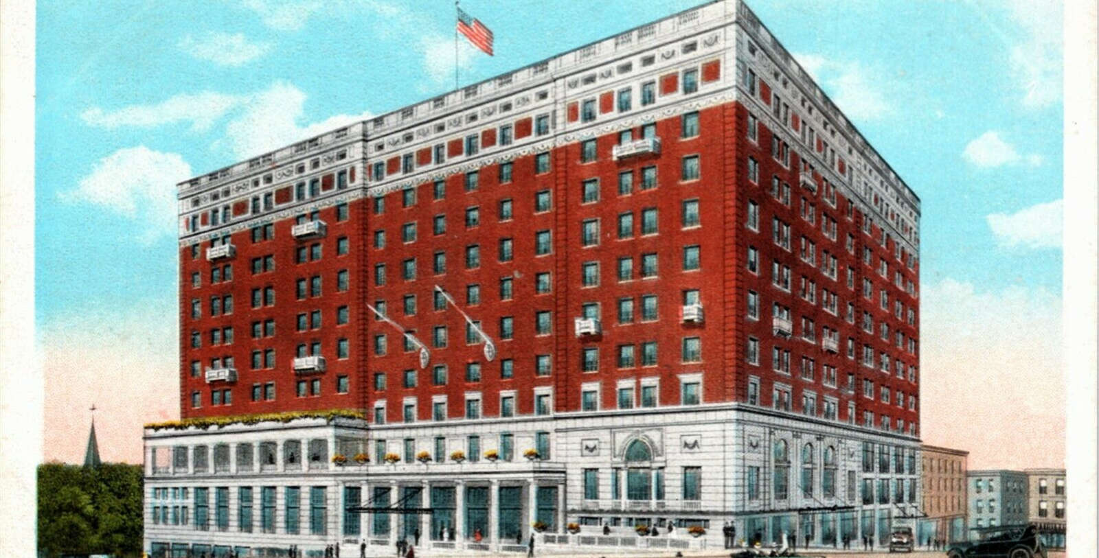 a large building with a flag on top