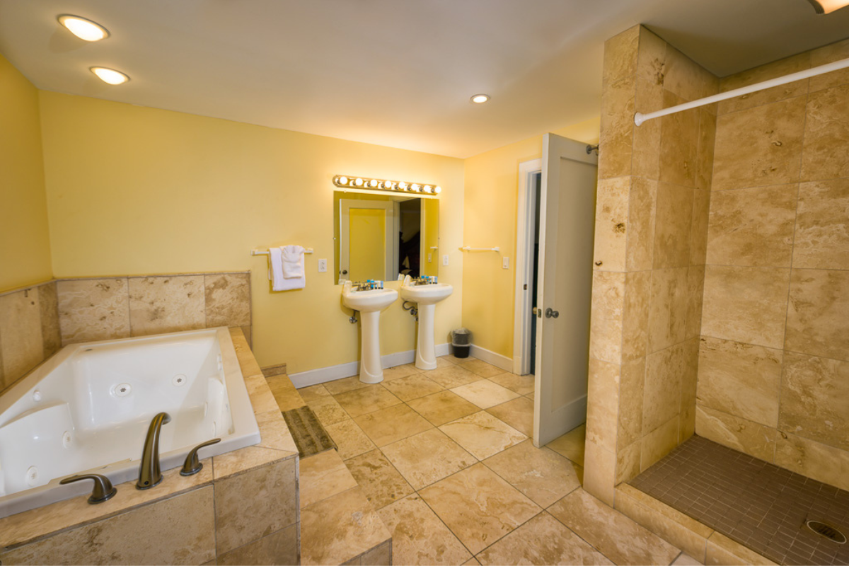 a bathroom with a bathtub and sink