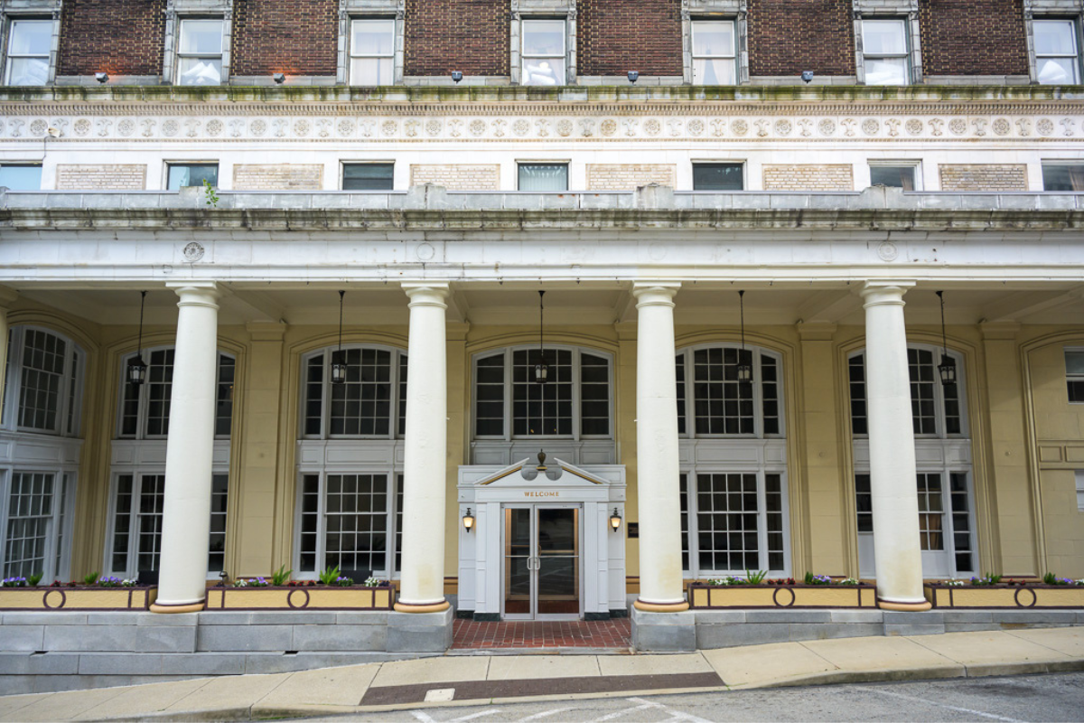 a building with columns and a door