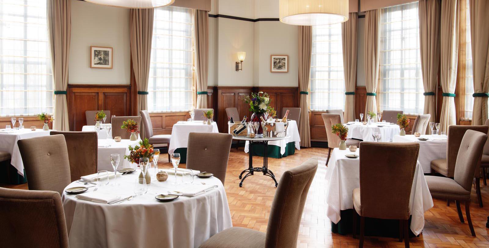 a restaurant with tables and chairs