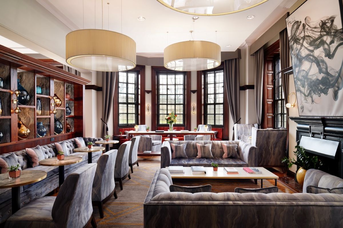a room with couches and tables