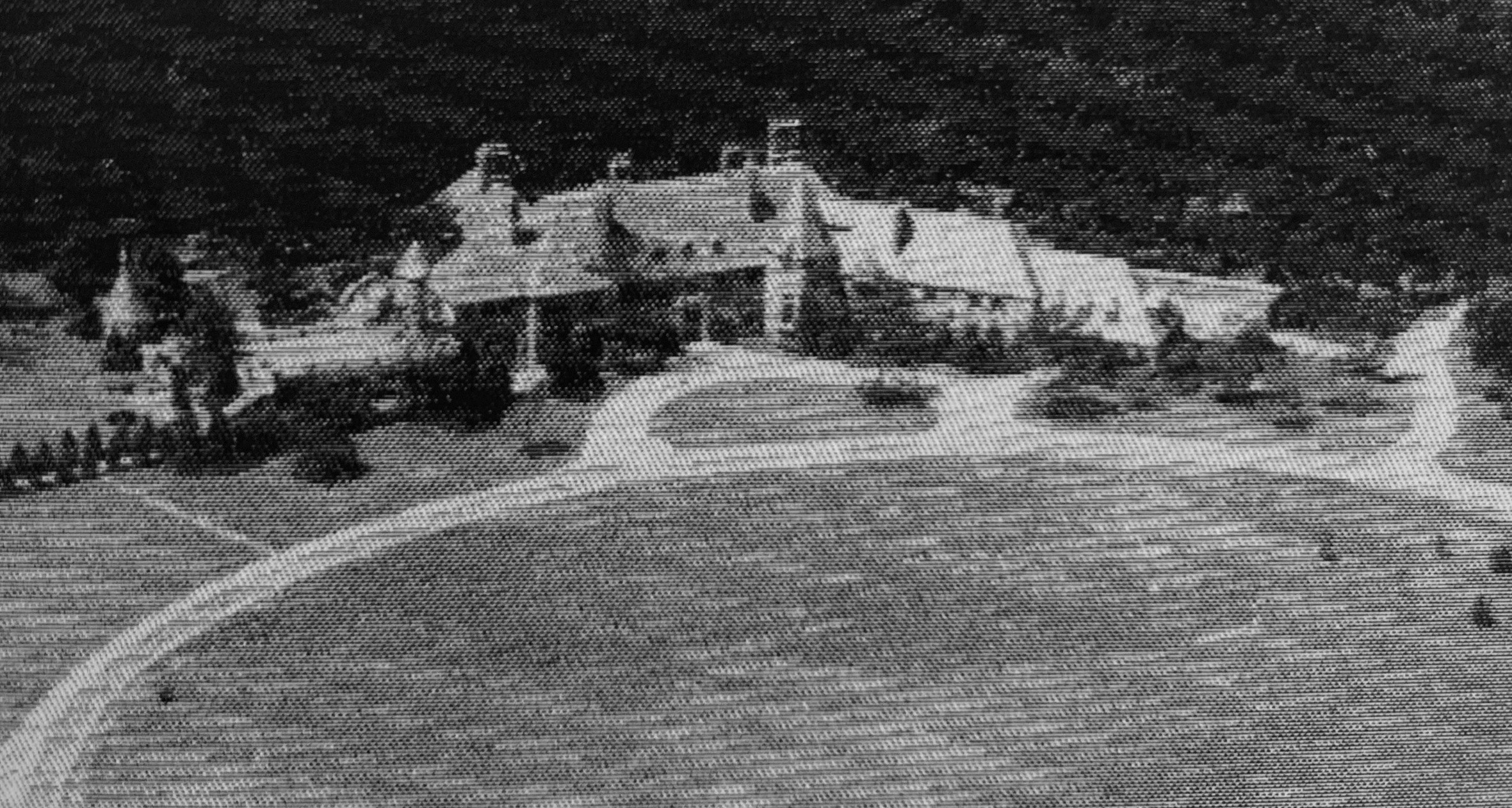 a large house with a large body of water