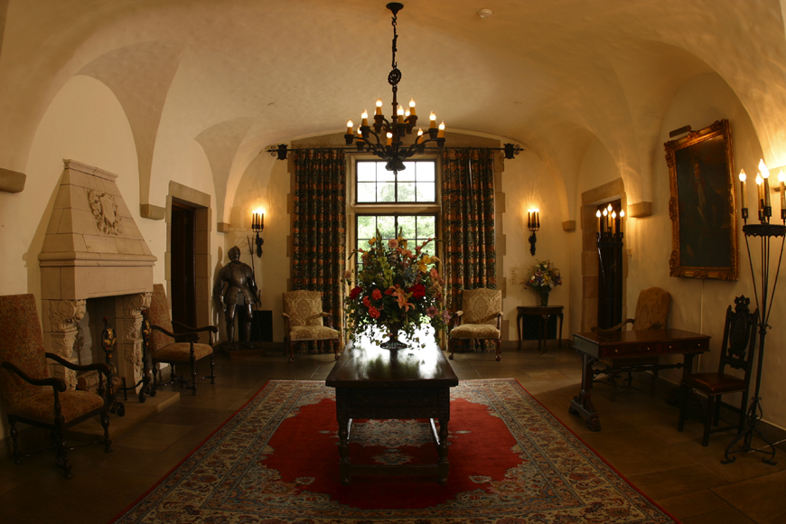 a room with a table and chairs