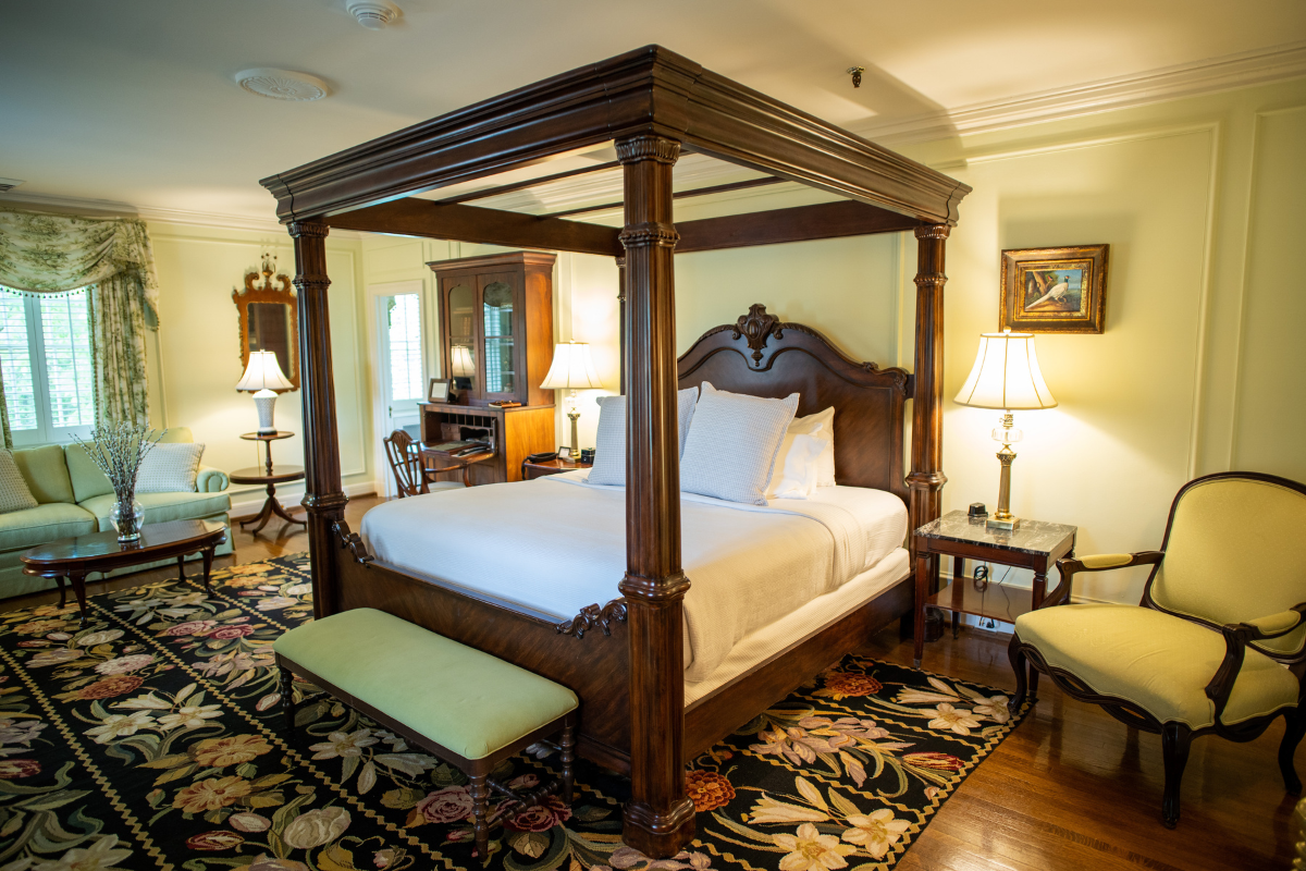 a bed with a canopy in a room