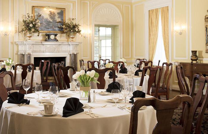 a room with tables and chairs