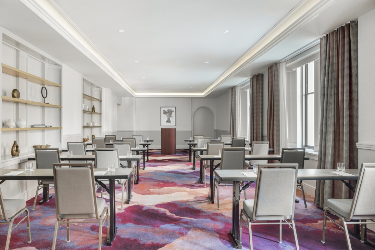 a room with tables and chairs