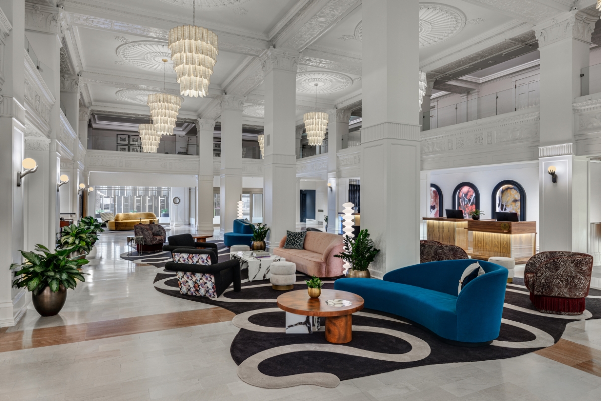 a large room with a large couch and a table