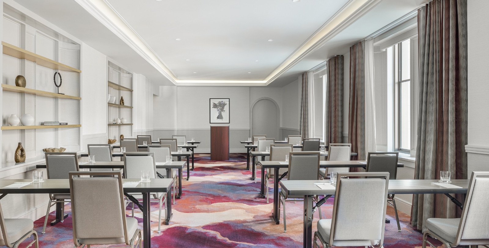 a room with tables and chairs
