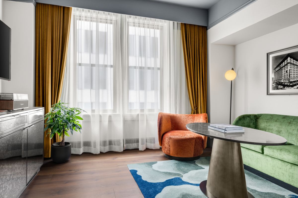 a room with a table and chairs