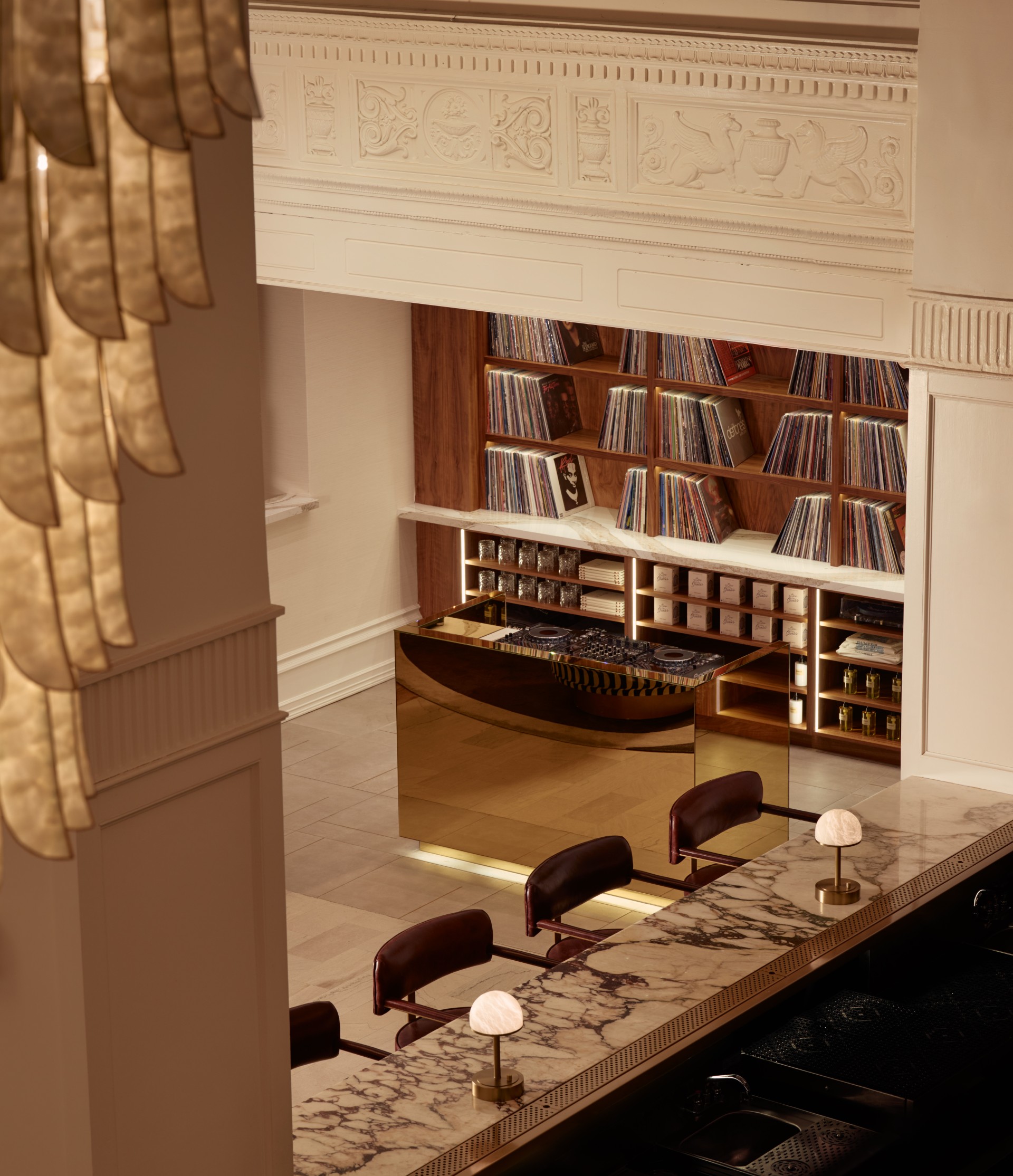 a room with a bookcase and a bar