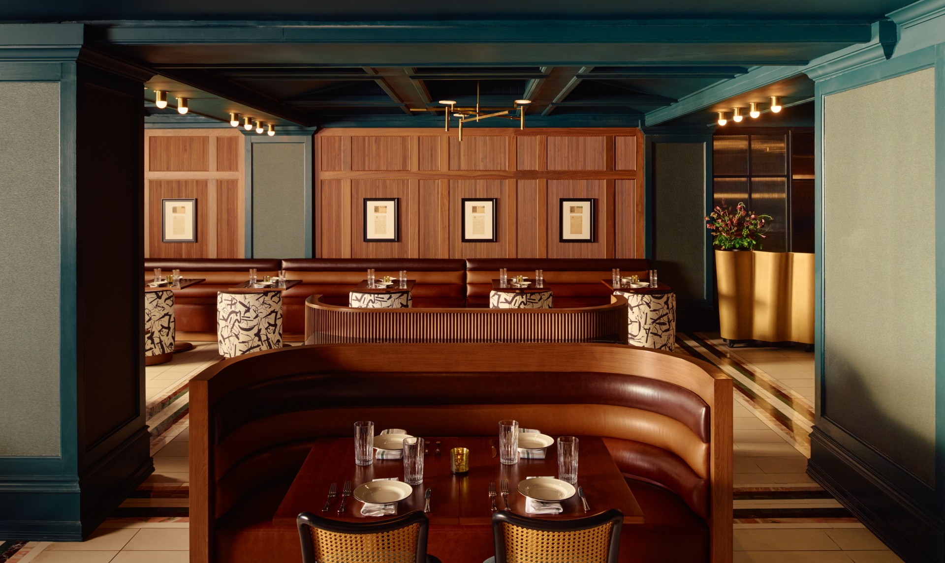 a restaurant with a booth and tables