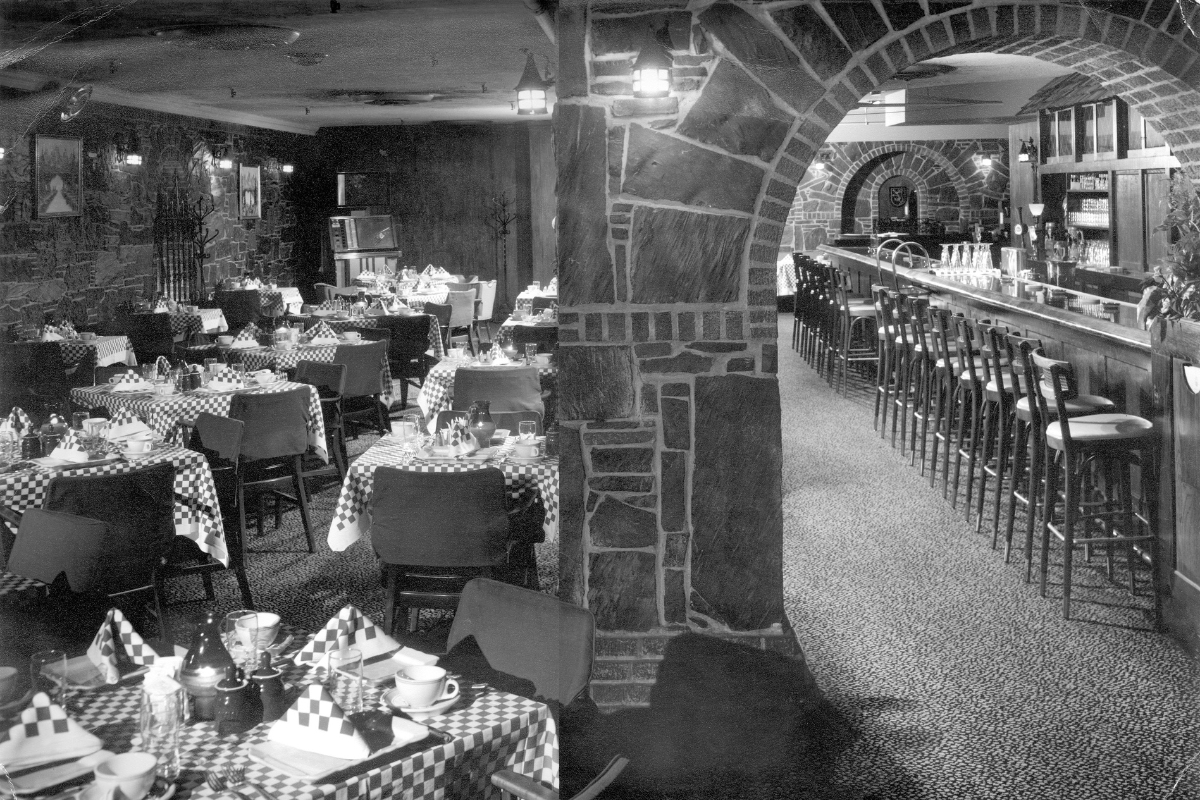 a restaurant with tables and chairs