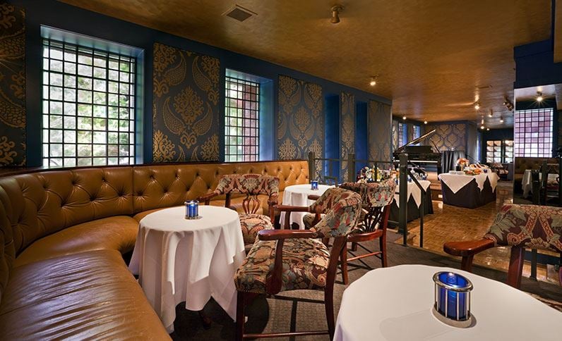a room with tables and chairs