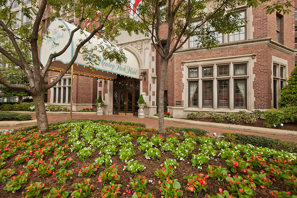 a flower bed in front of a building