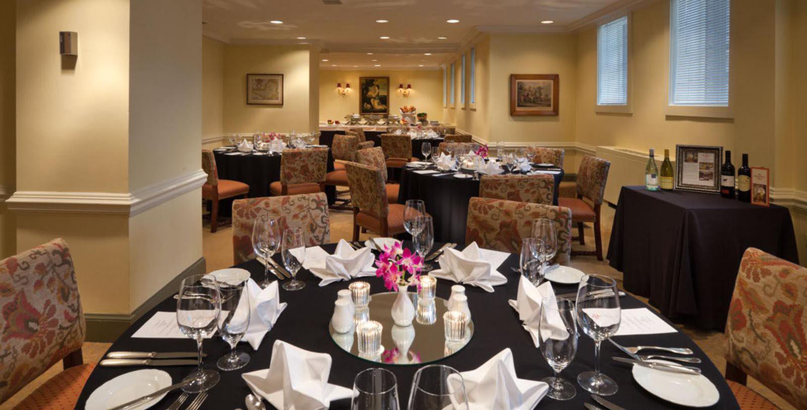 a room with tables and chairs