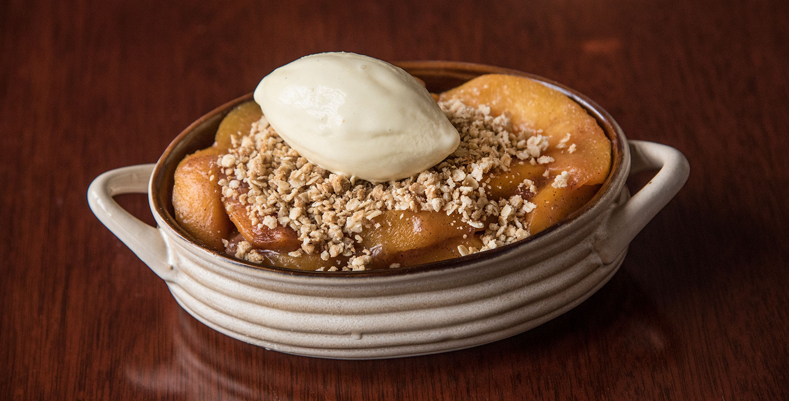 a bowl of food with a scoop of ice cream on top