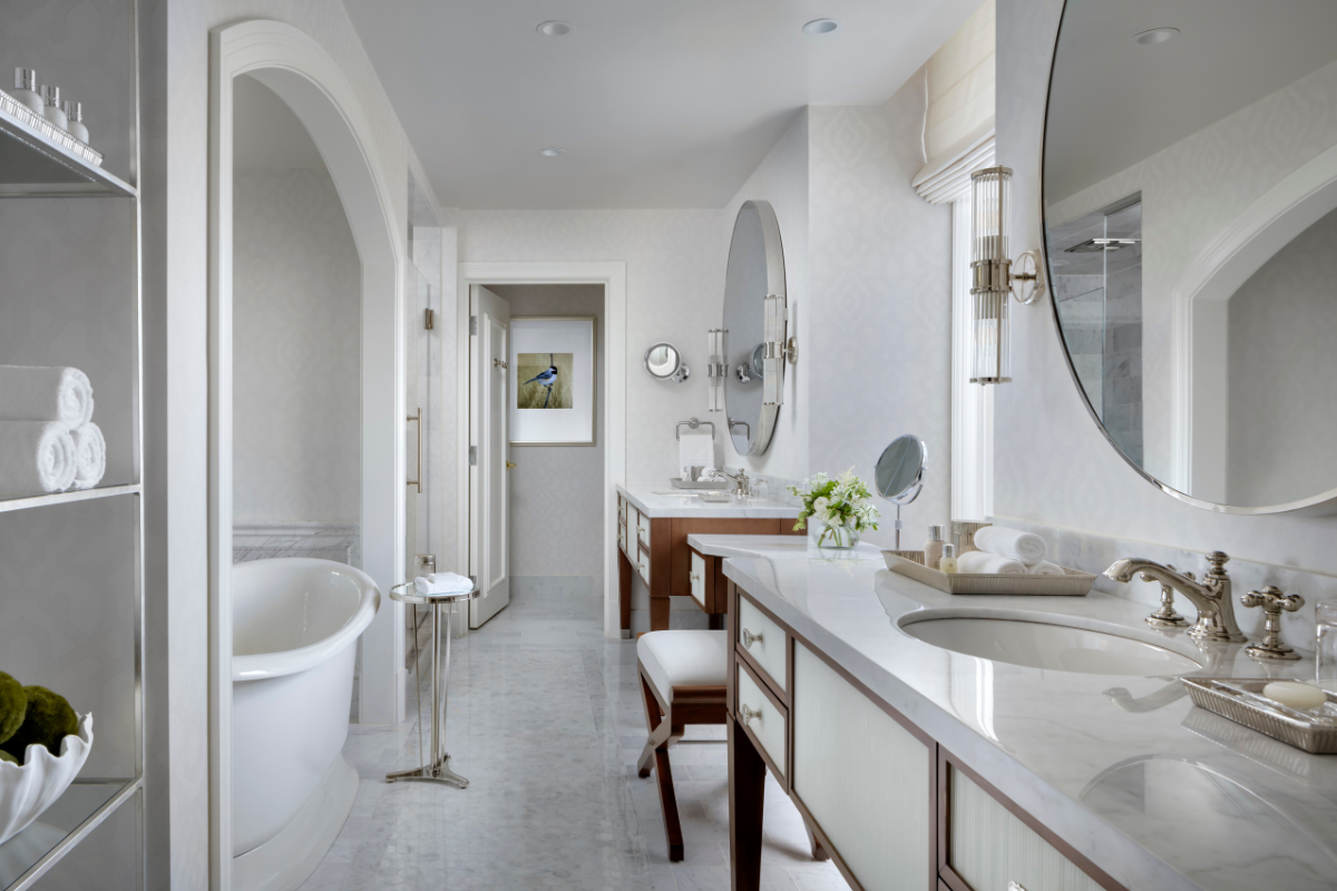 a bathroom with a tub and a sink